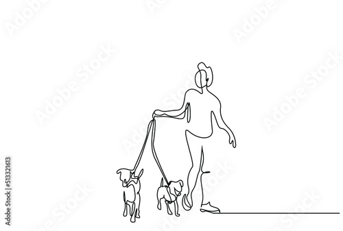 dog pet sitter a person walking the dogs. animal lover walks dogs photo