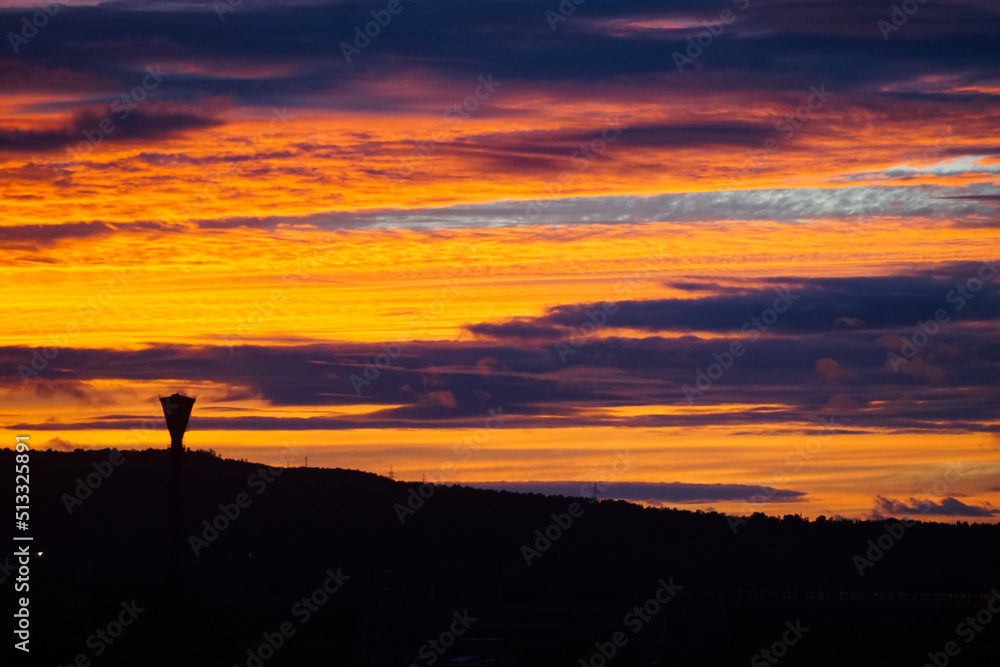 incredible fiery sunset, orange pink evening sky over earth, hills, mountains, hills and water tower, contrast dark photo, beautiful nature wallpaper, background incredible fiery sunset, orange pink evening sky over earth, hills, mountains, hills and water tower, contrast dark photo, beautiful nature wallpaper, background