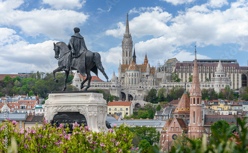 View of Buda side of Budapest, Hungary with the Buda Castle, St. Matthias and Fishermen's Bastion and Statue of Count Gyula Andrassy. View from the Hungarian Parliament Building photo