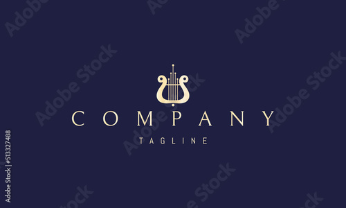 Vector golden logo on which an abstract image of a musical instrument Harp.