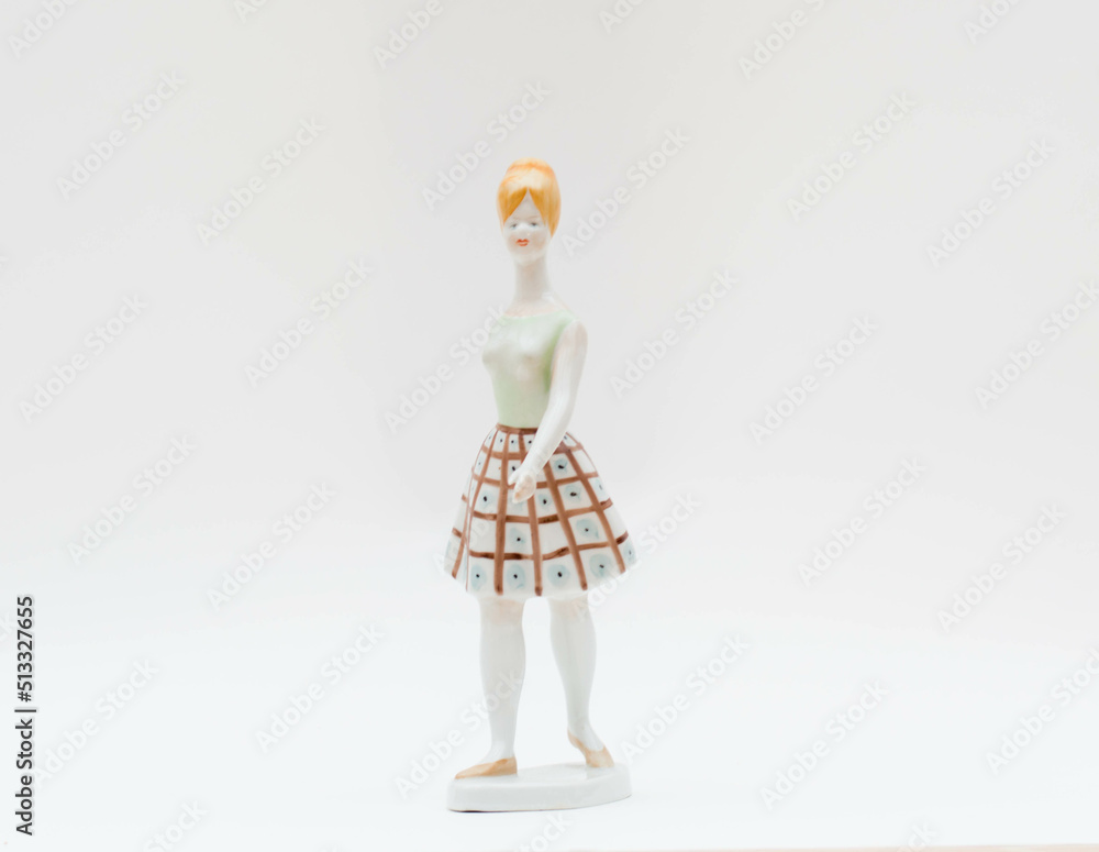Mid-century modern porcelain figurine - girl wearing retro dress Mid-century modern porcelain figurine - girl wearing retro dress