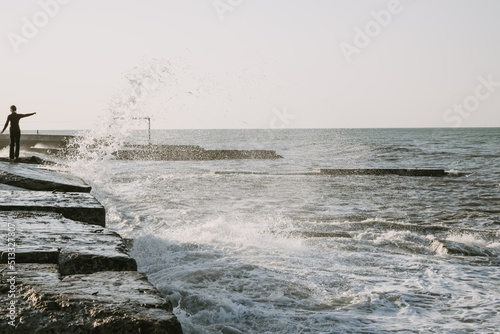 person walking on the beach