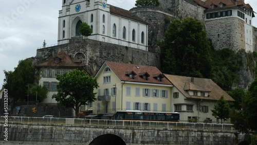 A roll up footage with noise effect of Aarburg Castle with Aare river insight during raining time.  photo