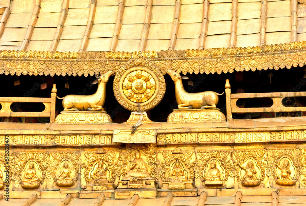 Fototapeta premium The roof is decorated with ancient and famous symbols of the famous Himalayas, Tibet. 