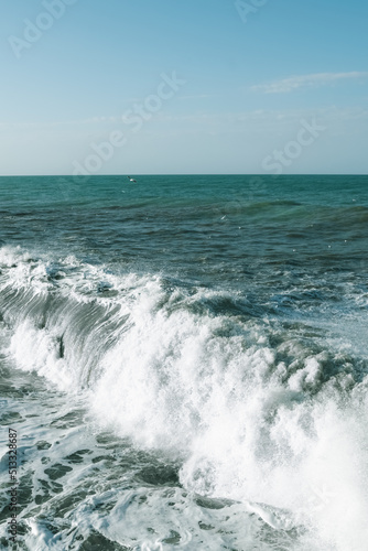 waves crashing on rocks