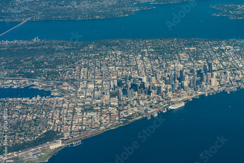 Seattle  Washington  aerial city view around Seattle Downtown with Space Needle  Piers  Pike Place Market and modern skyscrapers located at Elliot Bay