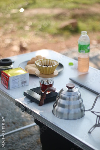 the coffee set put on the camping table 