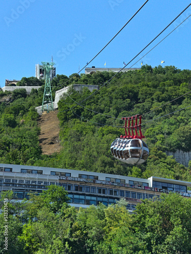 Grenoble, France - June 2022: Visit the beautiful city of Grenoble in the middle of the Alps with a view on the cable car called "les bulles"