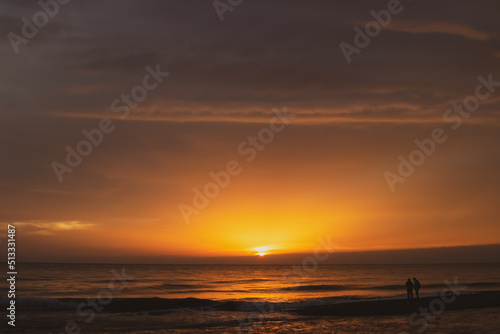 sunset on the beach © bykot