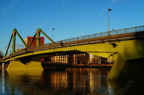 The Floesserbruecke in Frankfurt, Germany in the wintry, sunny evening light. photo