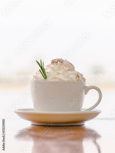 Photography Cup of Vienna Cappuccino coffee with fresh whipped cream on top