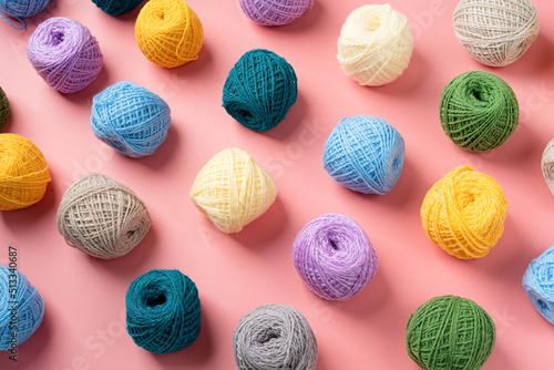 Fotografija bright and colorful yarn wool pattern on bright background, top view flat lay