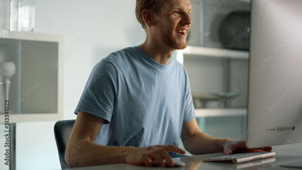 Excited worker talking online finishing conference call at remote home office. Excited worker talking online finishing conference call at remote home office.