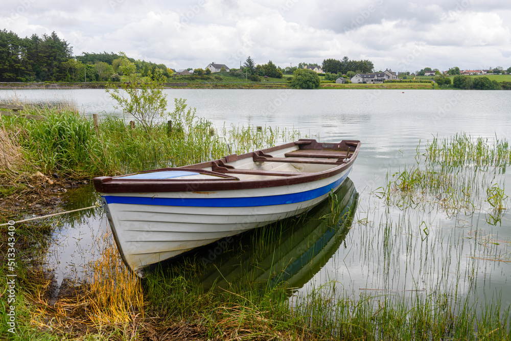 Rowing boat moored up at a lake Rowing boat moored up at a lake