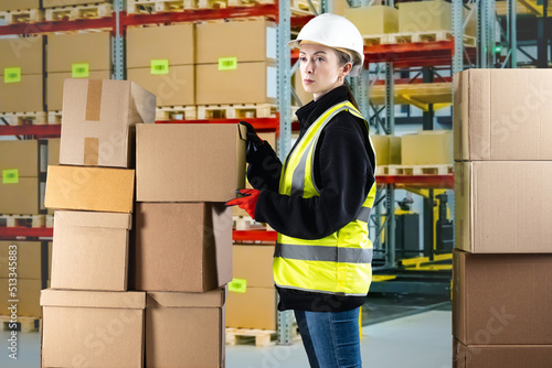 Warehouse woman. Portrait o...