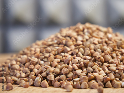 Pile of buckwheat  side view. Buckwheat macro. Buckwheat for porridge.