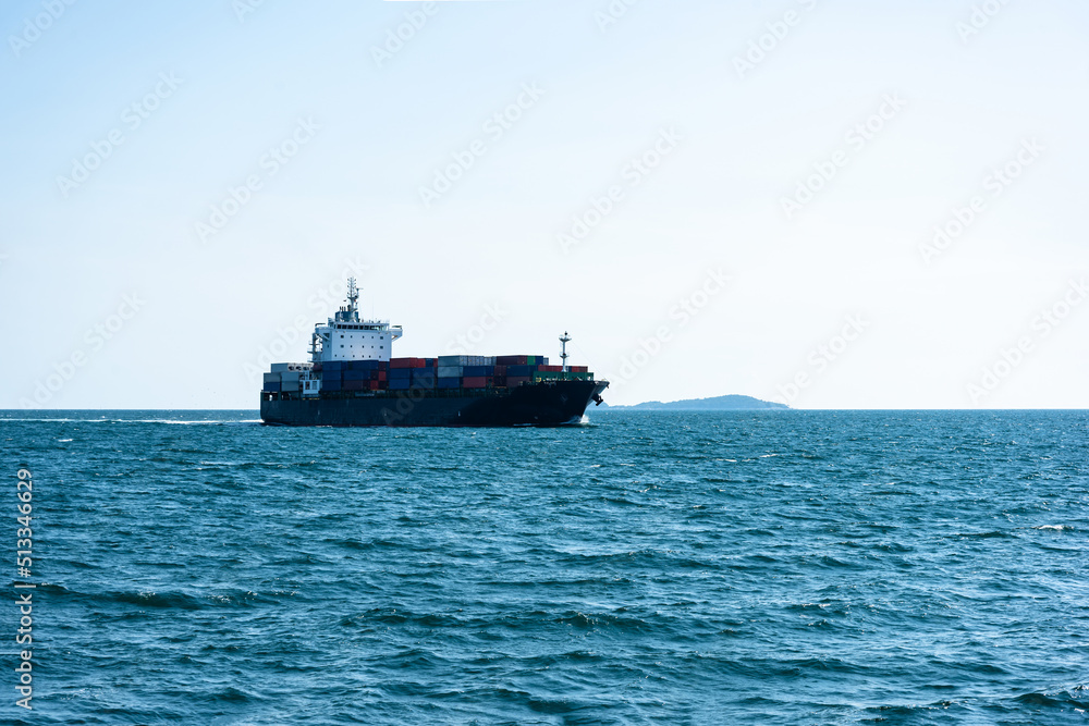 cargo ship with cargo containers in the Gulf of Thailand