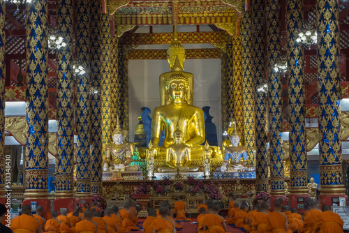 principle Buddha image of the third grade royal monastery, Wat Suan Dok, The attitude of subduing Mara, Mueang Chiang Mai District, Bangkok, Thailand photo