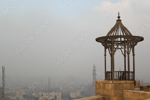 Foggy view from Mokattam Hills in polluted misty Cairo Egypt photo