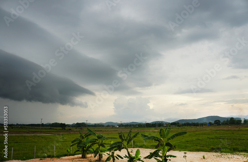 Gray shelf clouds.  The dark, protruding, multi layered clouds were known as shelfies, common in thunderstorms. photo