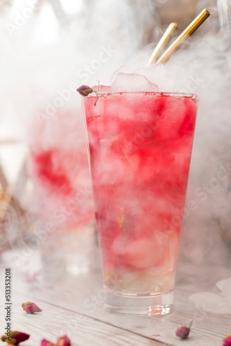 Cold drink ovshala. Refreshing summer pink lemonade. Rose cocktail. vertical position.