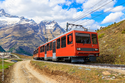 Beautiful view of the Swiss Alps with cogwheel train of Gornergrat railway close to Zermatt, Switzerland photo