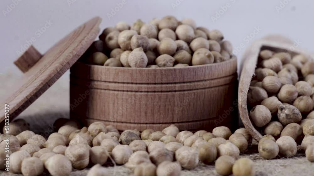 Close-up. Chickpea beans in a wooden bowl Close-up. Chickpea beans in a wooden bowl
