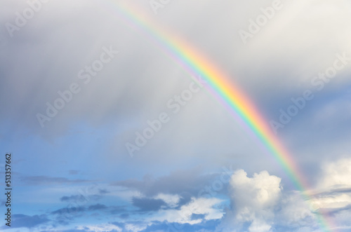 Rainbow over sky. Art photo. Soft nature colors