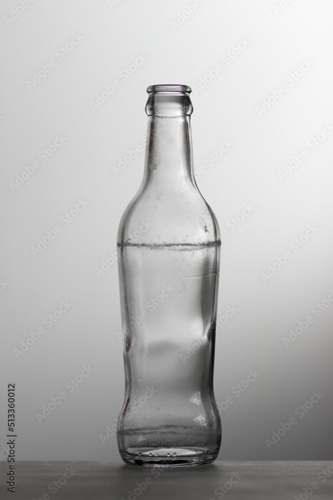 Silhouette of old transparent glass bottle on white background Silhouette of old transparent glass bottle on white background
