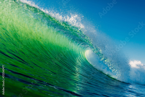 Fototapeta Naklejka Na Ścianę i Meble -  Ideal barrel wave with green tones in ocean. Swell waves for surfing