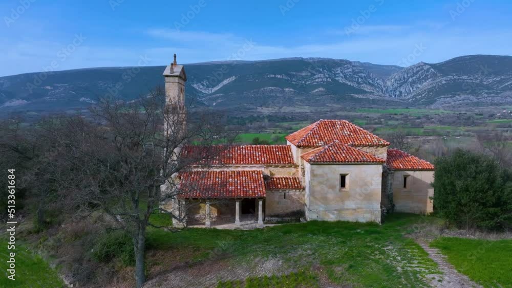 Church of San Esteban in the Town of Toba de Valdivielso seen from a drone. Merindad of Valdivielso. The Meringues. Burgos, Castilla y Leon, Spain, Europe Church of San Esteban in the Town of Toba de Valdivielso seen from a drone. Merindad of Valdivielso. The Meringues. Burgos, Castilla y Leon, Spain, Europe