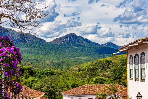 Houses, mountains and forest in the historic city of Tiradentes in the state of Minas Gerais photo