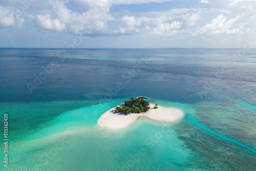 Fototapeta Naklejka Na Ścianę i Meble -  Aerial view in Maldives atoll island.  Tropical aerial landscapes of Maldives paradise lagoon beaches.