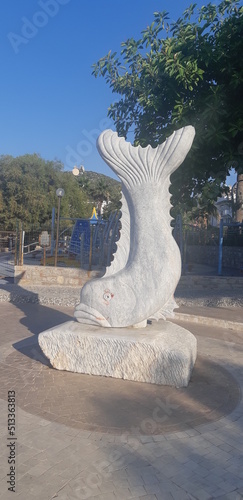 dolphin fish stone sculpture shaved history
