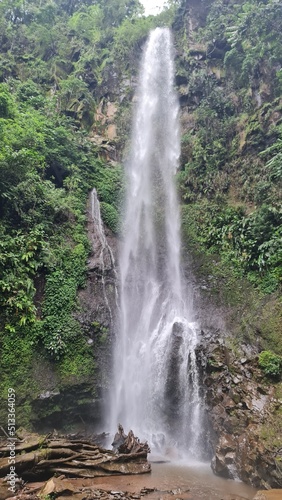 Spectacular lush 200+ feet tall waterfall in Costa Rica