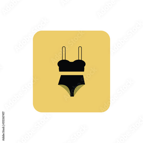 Swimsuit vector icon on green isolated background.