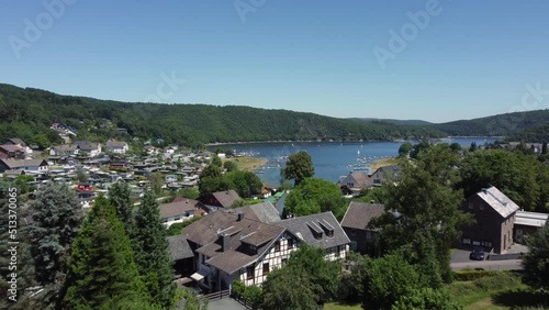 Woffelsbach lake with sailboats. Bushy and hilly landscape photo