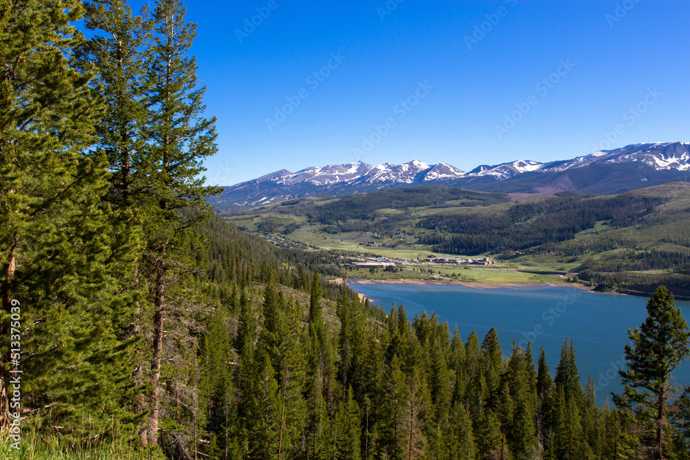 High-elevation view of the Colorado Rockies from across Dillon Reservoir at dawn in spring