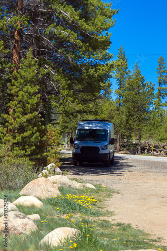 Camper van in the shade high up in the Rocky Mountains of Colorado © Martha Marks