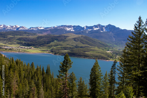 High-elevation view of the Colorado Rockies from across Dillon Reservoir at dawn in spring