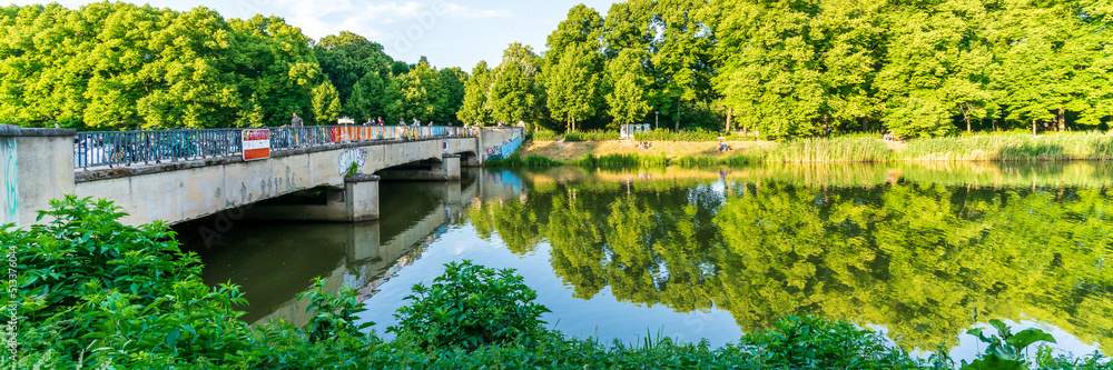 Fototapeta premium Leipzig, Germany - June 10 2022: View at the Saxony Bridge in the Clara Zetkin Park in Leipzig