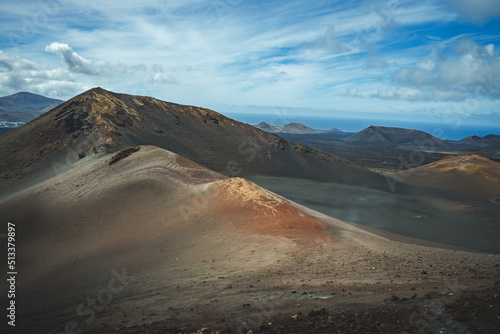 black volcanic landscape and mountains in national park timanfaya on lanzarote