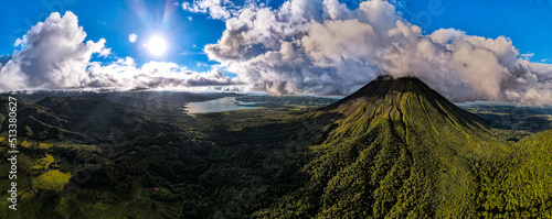 Beautiful aerial view of the Arenal Volcano, the arenal Lagoon, and rain forest in Costa Rica photo