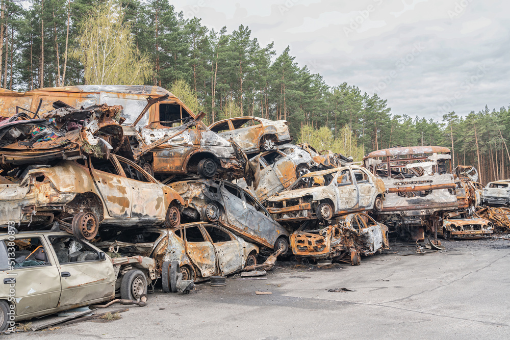 Landfill destroyed cars. They were  burned or shot by artillery (concept of killing civilians)