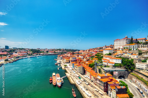 Porto Aerial Cityscape over Douro River during a Sunny Day © romanslavik.com