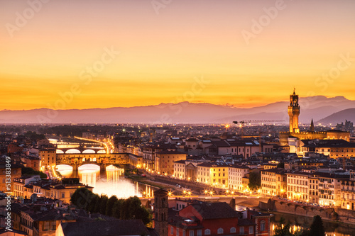 Florence Aerial View at Golden Sunset over Ponte Vecchio Bridge, Palazzo Vecchio and Cathedral of Santa Maria del Fiore with Duomo