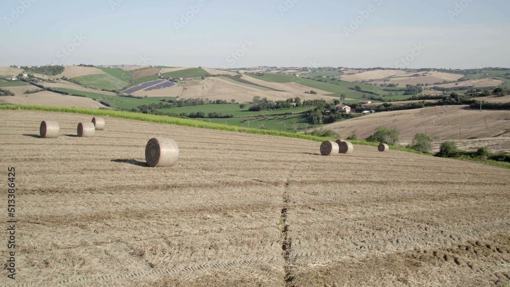 Fototapeta premium A photo of haystacks in a camps