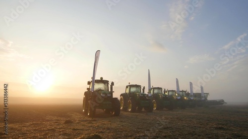 A photo with tractors in a camps