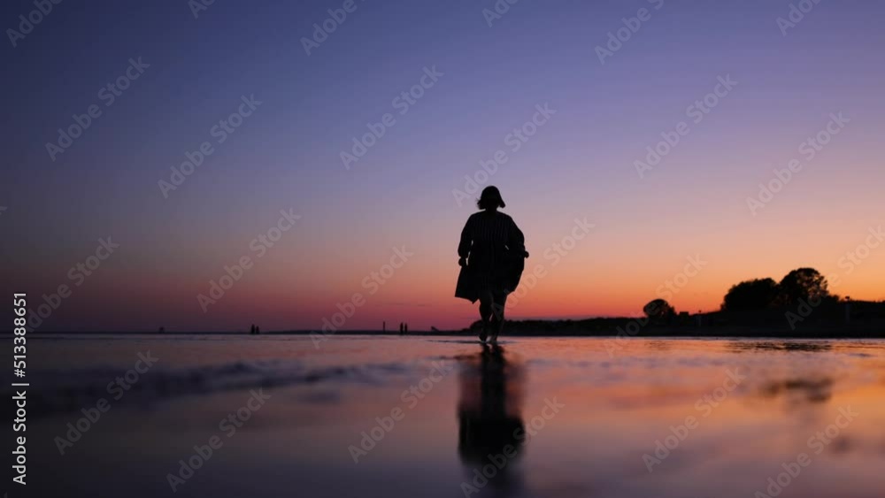 woman running sunset on beautiful beach in europe on water splashing pärnu beach slowmotion woman running sunset on beautiful beach in europe on water splashing pärnu beach slowmotion