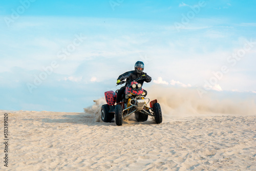 Atv freeriding in sand quarry, extreme sport